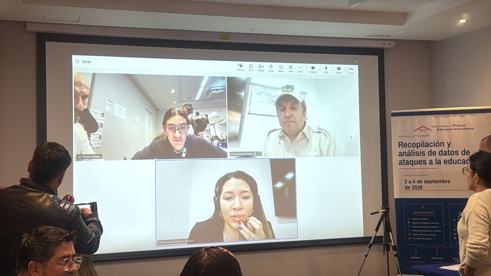 Participants watch a live video call with the simulation's fictional governors during the GCPEA Training of Trainers, Bogotá, September 2026.